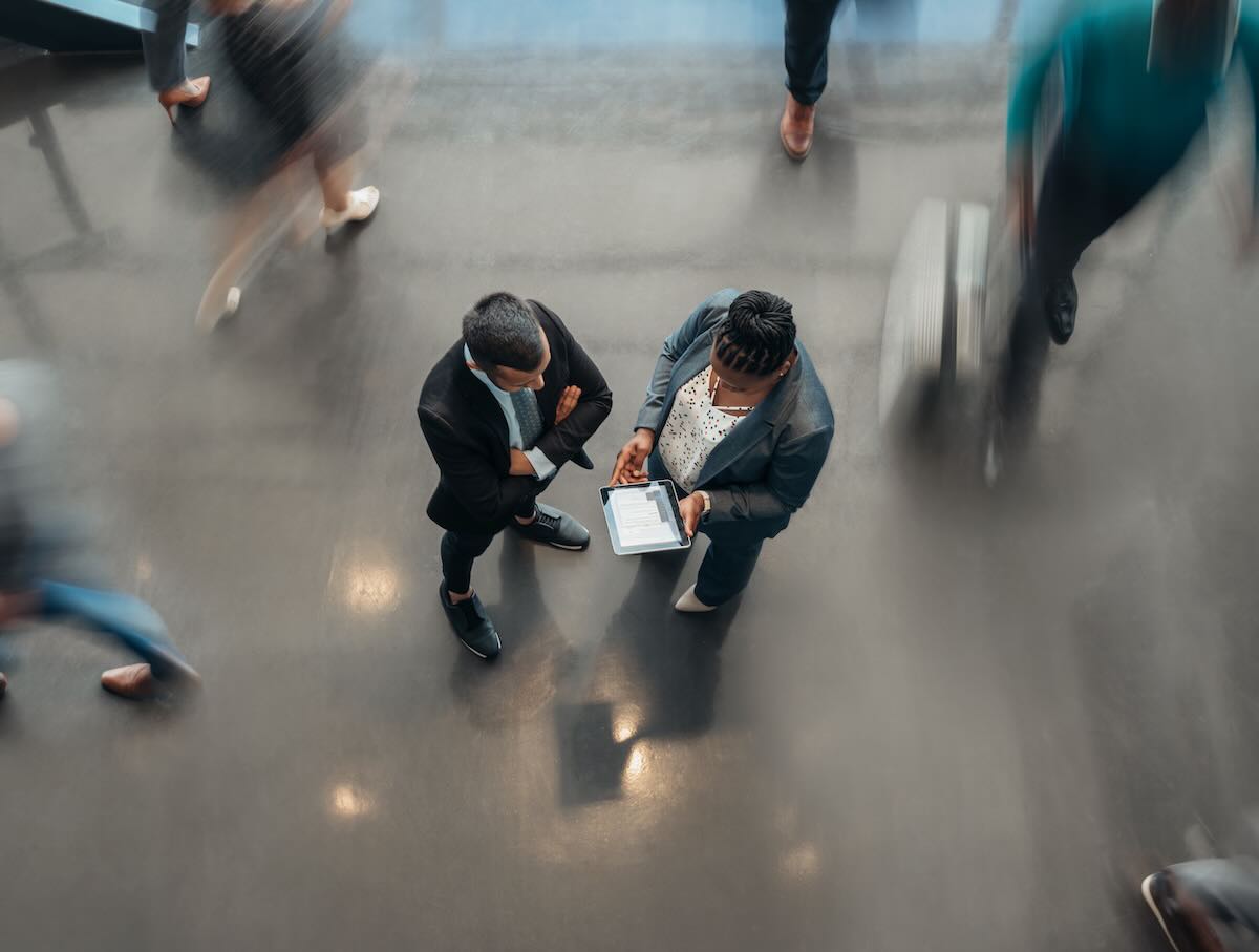 Business people talking, photo taken from above