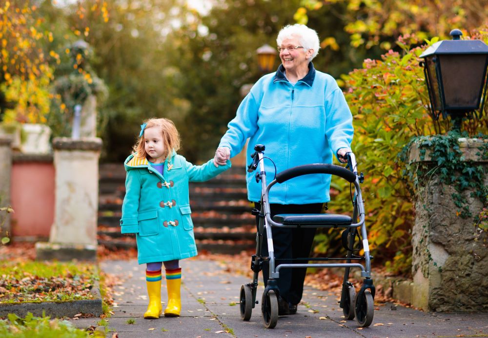 Senior lady with her granddaughter on a walk